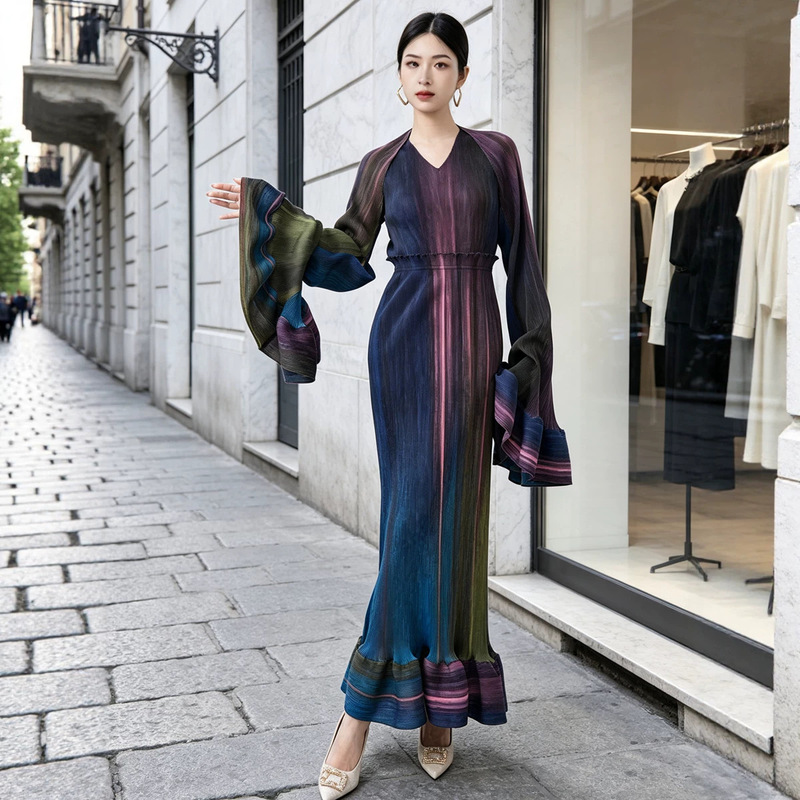 Cross-border women's fashion: Miyake-style dress with unique design, niche appeal, long cape, flared sleeves, and a fitted waist, creating a long, elegant gown