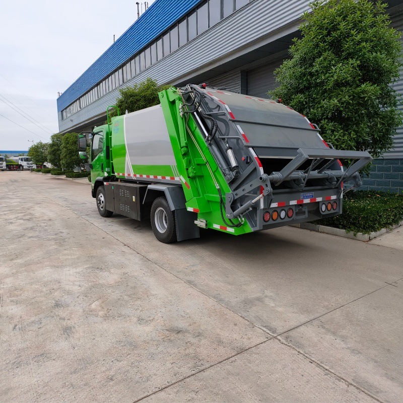 Electric-powered, compression-type garbage trucks with a sealed compression system for separate collection of wastewater, and new energy-powered sanitation garbage collection vehicles