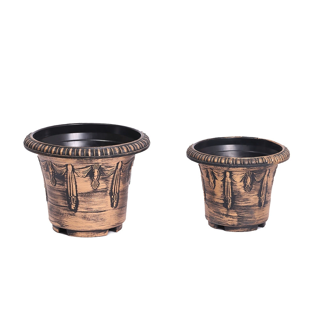 Ретро большой рот, старый бронзовый пластиковый цветочный горшок цветы зеленые растения садоводство классический рисунок