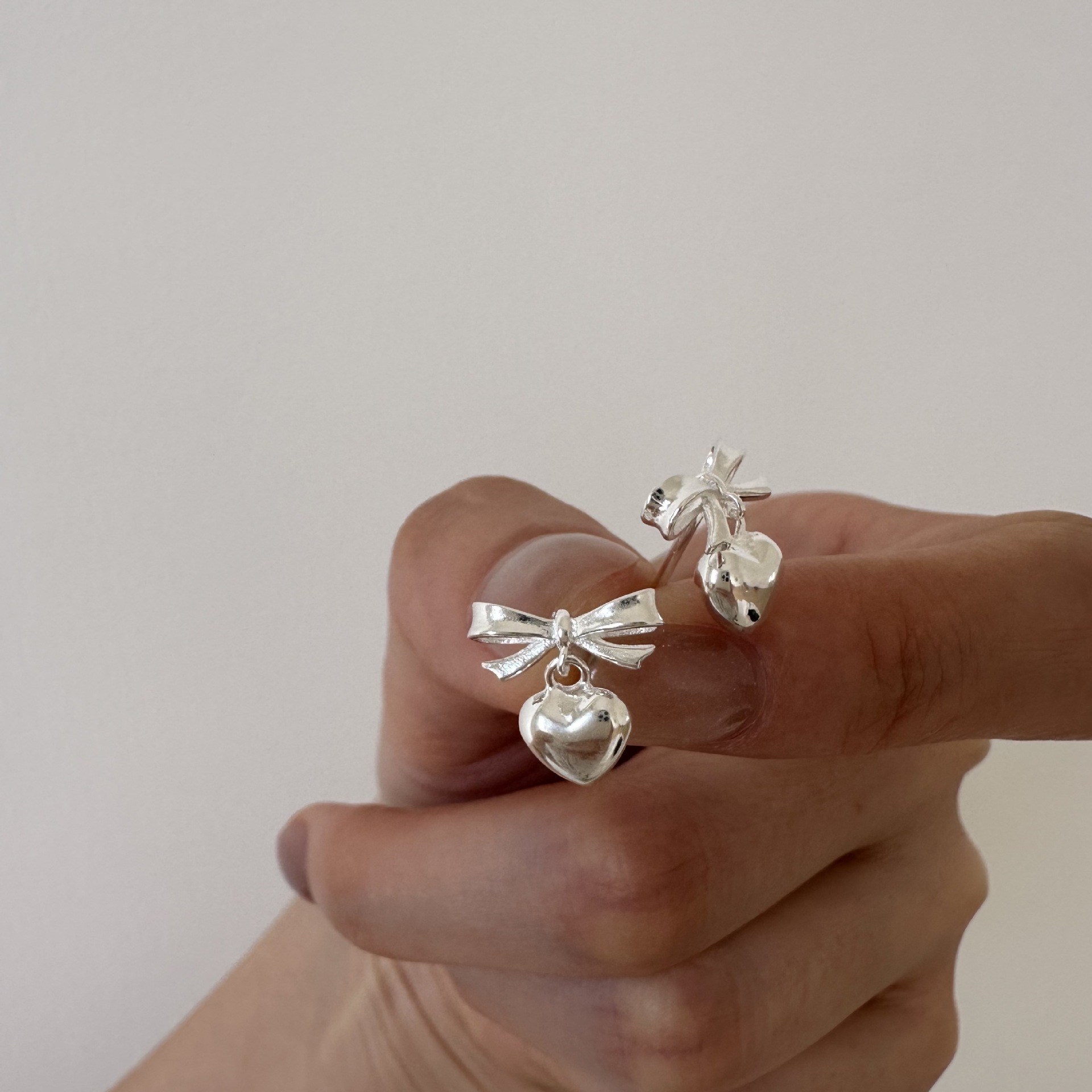 Small cute elegant earrings with bow