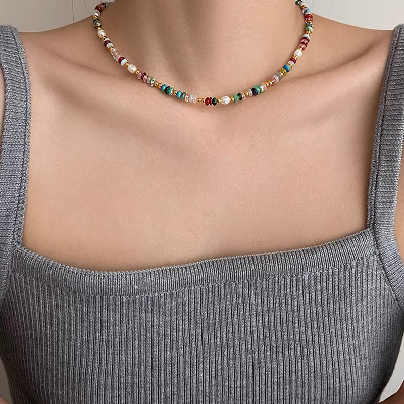 Collar de perlas con lazo de súper hada, cadena de clavícula de moda de lujo ligero francés, sentido de alta gama, joyería de nicho de arte, mujer al por mayor
