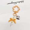Orange (upgraded flowers + bow + love)