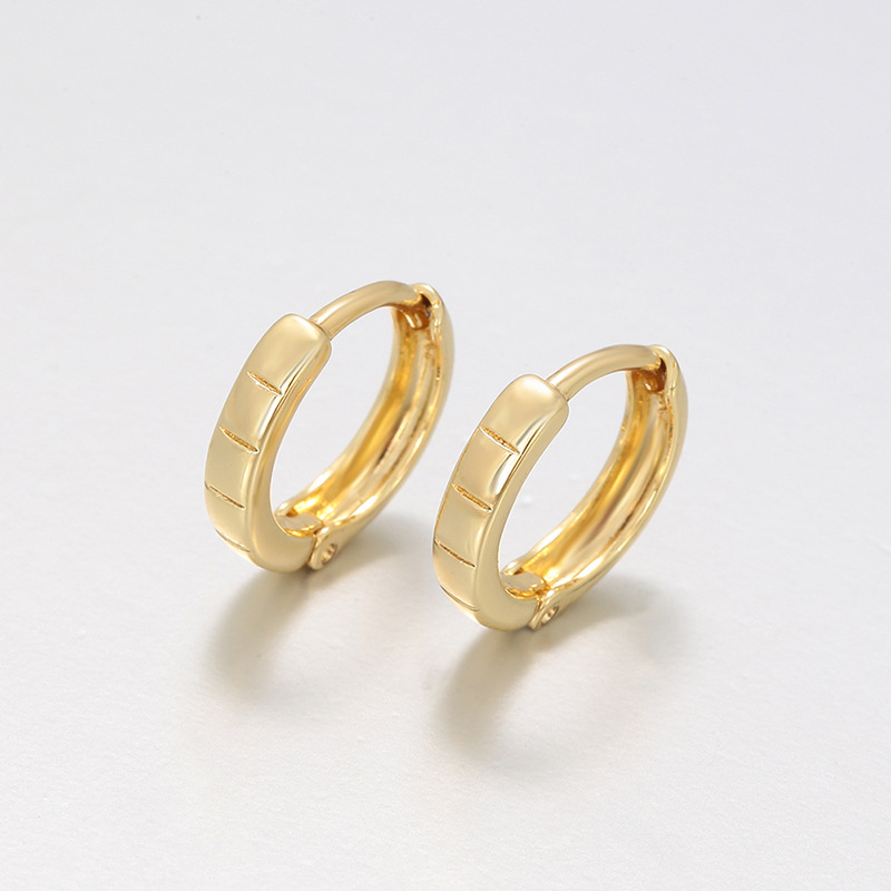 Xuping simple rayas brillante geometría círculo auriculares Europa y América transfronterizas aleación de cobre ligera de lujo personalidad auriculares personalizados