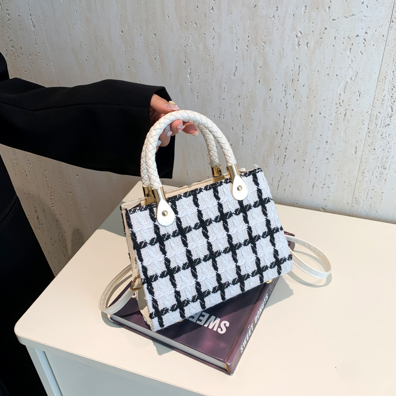 Diseño de tela de tela portátil Daffy bolso para mujeres 2024 nueva moda primavera y verano bolso de hombro