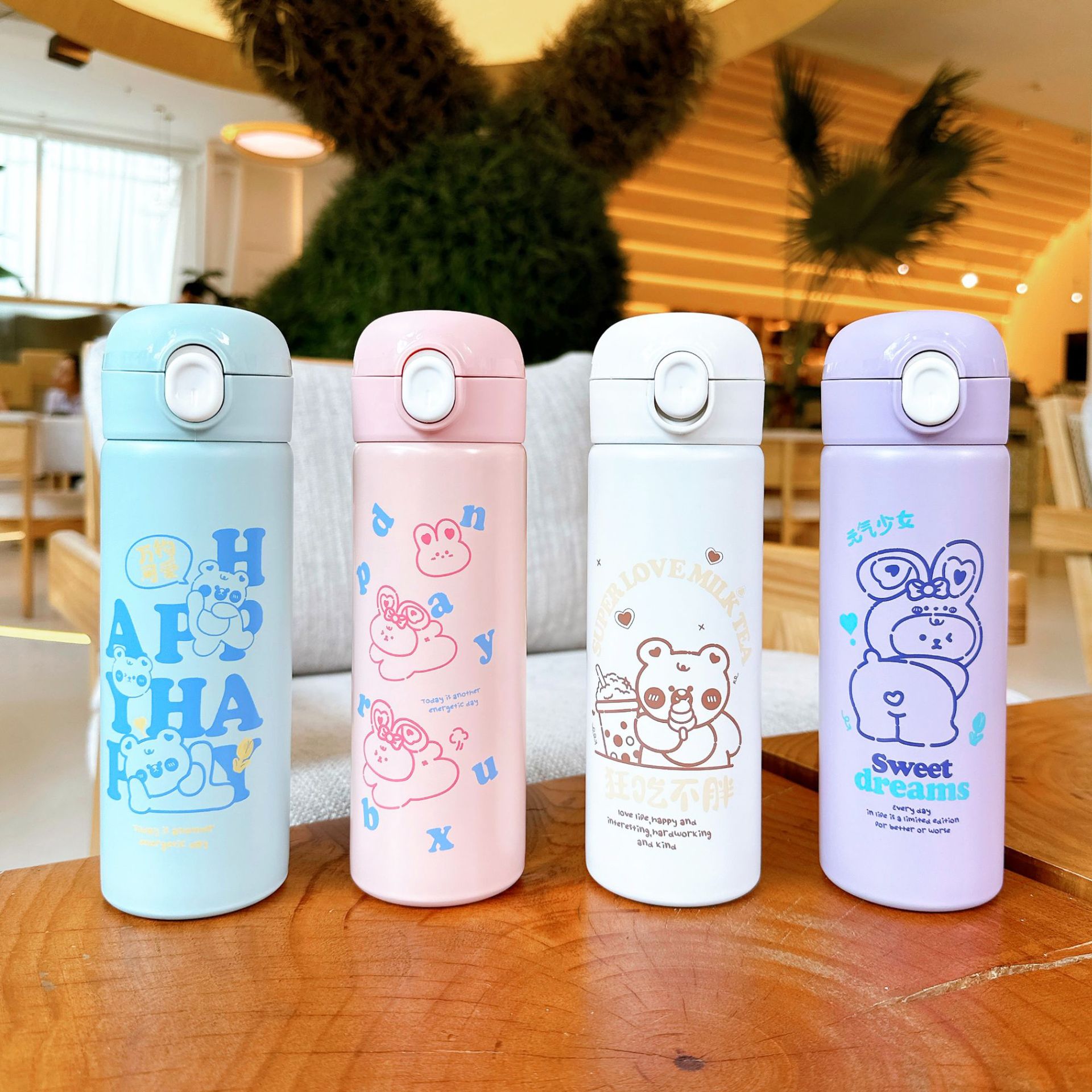 Nuevo lindo taza de agua de acero inoxidable simple de dibujos animados taza de bebida directa portátil cubierta elástica estudiante taza de vacío de alto aspecto