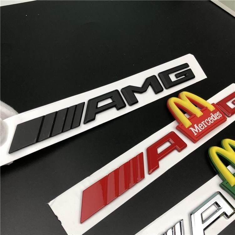 Mercedes-Benz C-Class, E-Class, and S-Class modified with AMG emblems, McDonald's car logos, BMW M logos, and new AMG tail emblems with black lettering