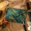 1 gilt dark green envelope