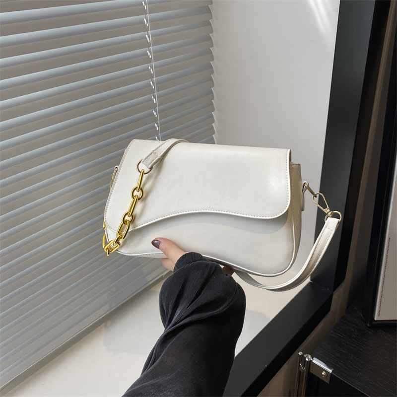 Bolso de mujer de alta calidad 2024, nuevo nicho de moda extranjera sensación de estilo de viaje simple cadena de empalme retro mochila