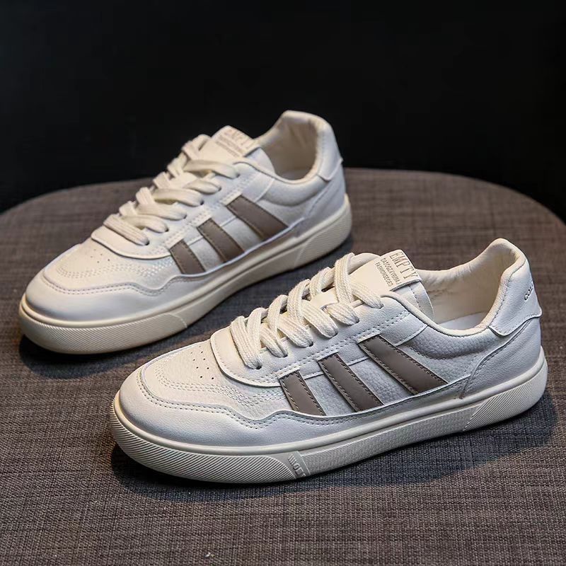 Zapatos de mujer de cuero zapatos blancos mujeres 2025 primavera nuevo estilo rayas planas todo fósforo deportes y zapatos de tablero casual