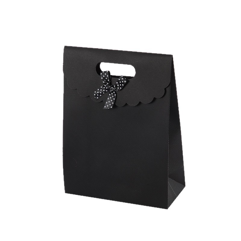 Bolsa de regalo con lazo multicolor, bolsa de mano de polipropileno con tapa abatible, bolsa de regalo con diseño hexagonal tipo ramo.