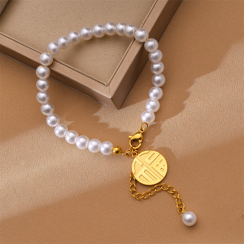 Ventas transfronterizas calientes de acero de titanio Fu marca imitación pulsera de perla mujer no decoloración brazalete de joyas de mano de diseño de alta gama al por mayor