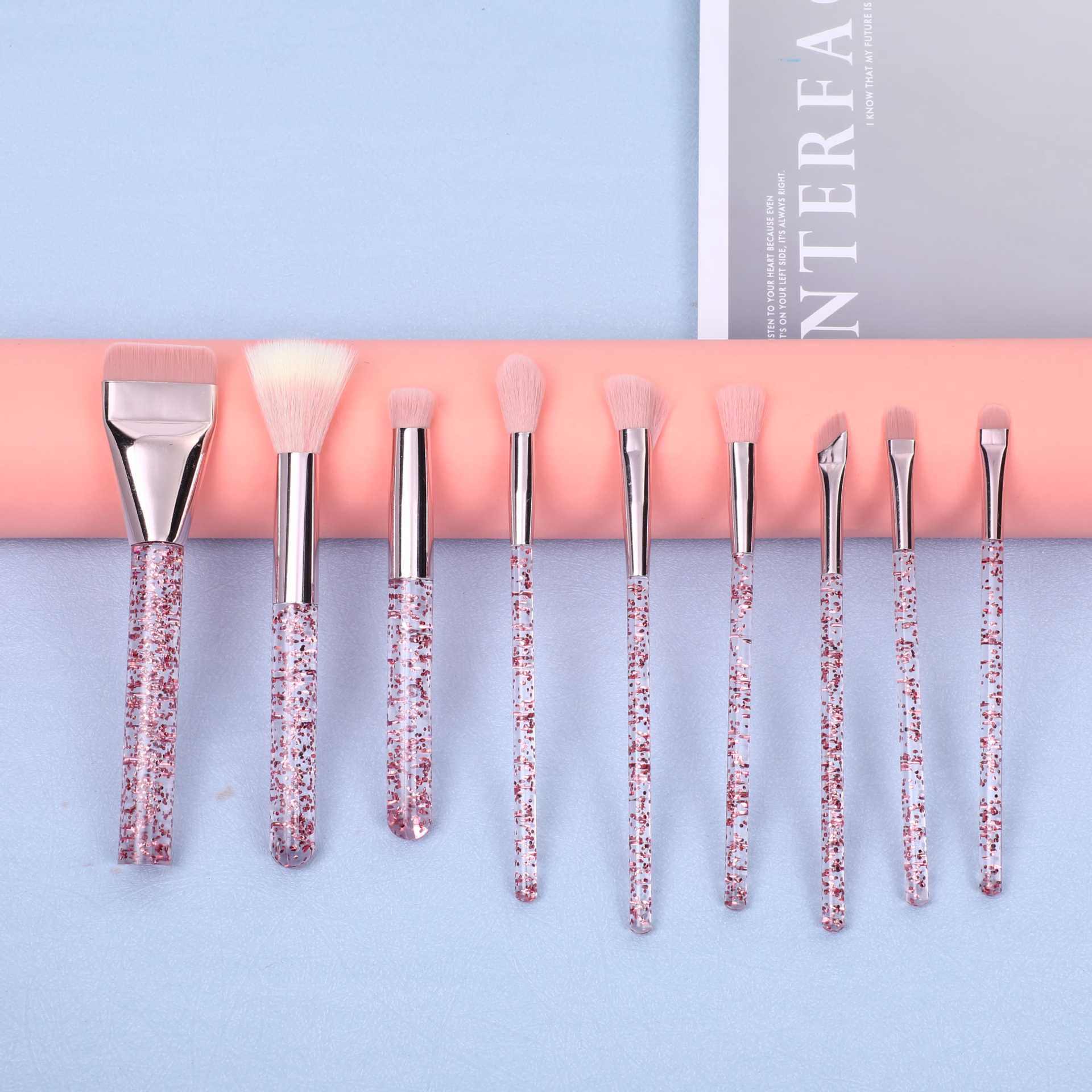 Productos explosivos transfronterizos de cerezo en polvo Dai9 cepillo de maquillaje de cristal, un cepillo de base de palabra, un conjunto completo de cepillo de maquillaje de belleza