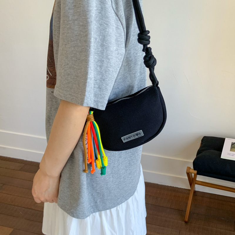 Bolso de lona de moda coreana 2025 verano nuevo bolso femenino casual estilo universitario bolso de hombro bolso de mensajero de malla hueca