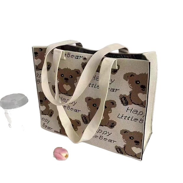 Cartoon adorable oso de gran capacidad bolso de hombro portátil de moda versátil bolso de punto de viaje bolso de mamá bolso especial