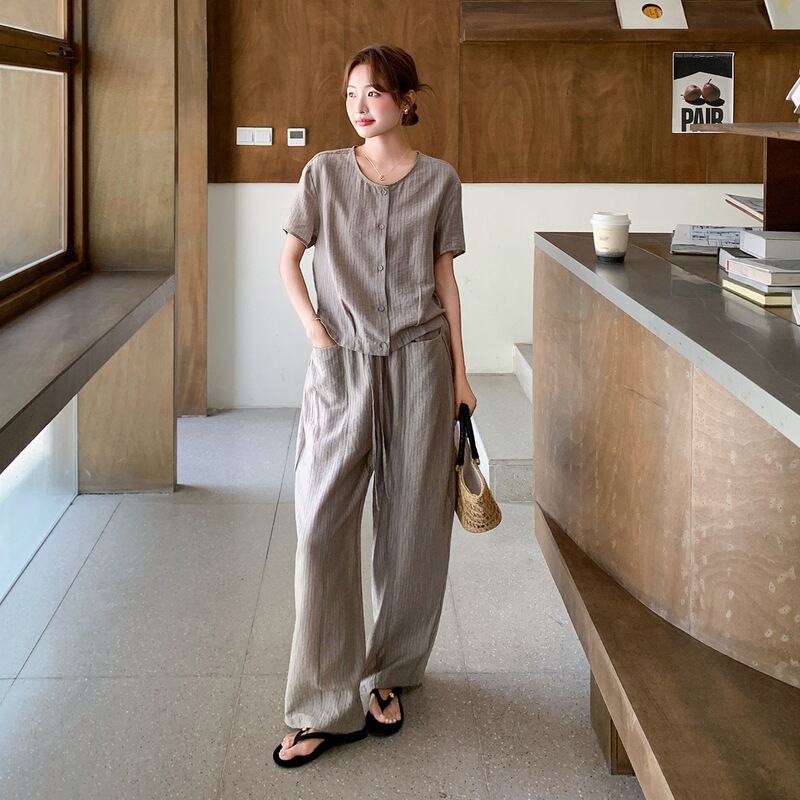 French High-End Casual Suit for Women 2026 Early Summer New Fashion Round Neck Short-Sleeved Top Wide-Leg Pants Two-Piece Set French High-End Casual Suit for Women 2026 Early Summer New Fashion Round Neck Short-Sleeved Top Wide-Leg Pants Two-Piece Set