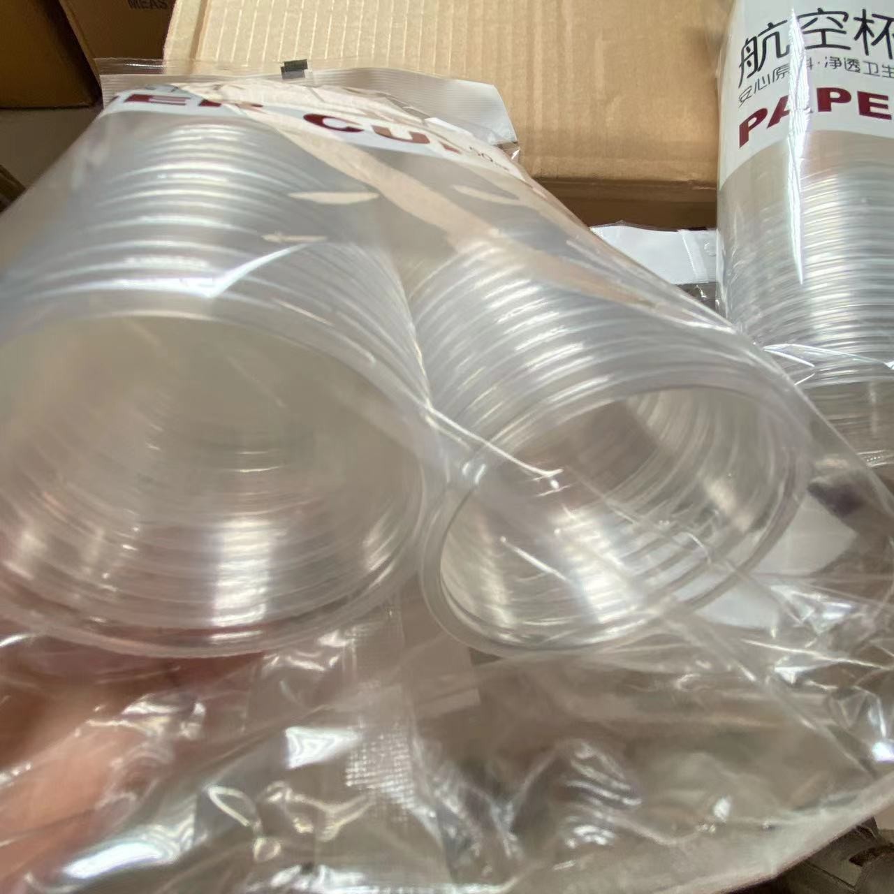 Vasos de papel desechables, vasos de plástico, vasos espaciales, vasos de aviación, vasos de bebidas de jugo de frutas comerciales engrosados para el hogar, transparentes al por mayor