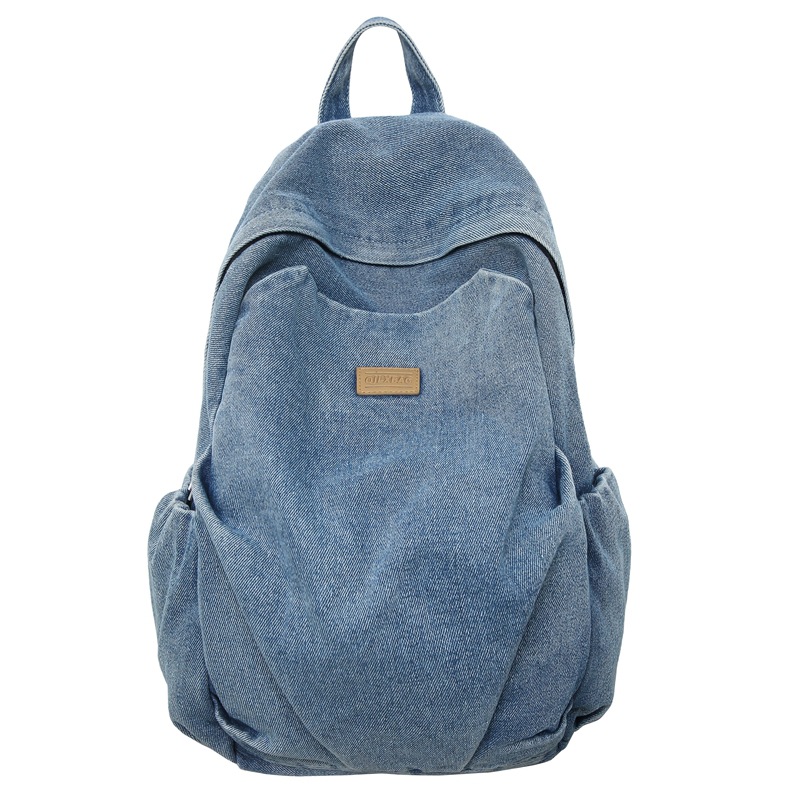 Mochila de mezclilla de gran capacidad para estudiantes de secundaria para mujeres, bolsa de viaje ligera, mochila de ocio estilo de Hong Kong, mochila al por mayor