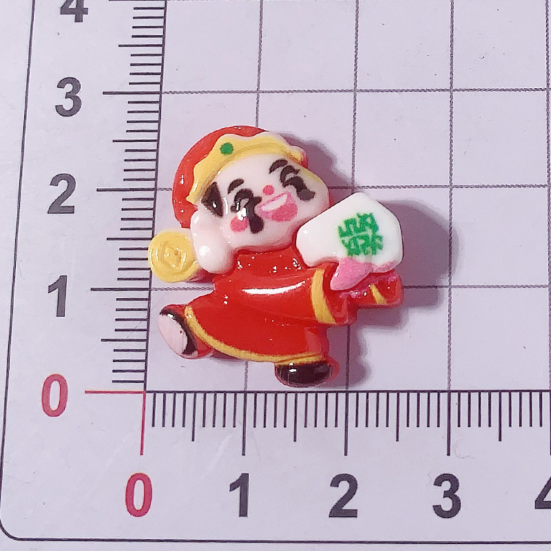 Año Nuevo dibujos animados dios de la fortuna Yuanbao accesorios de resina agujero zapatos caja de teléfono celular crema pegamento DIY automóvil control central dios de la fortuna