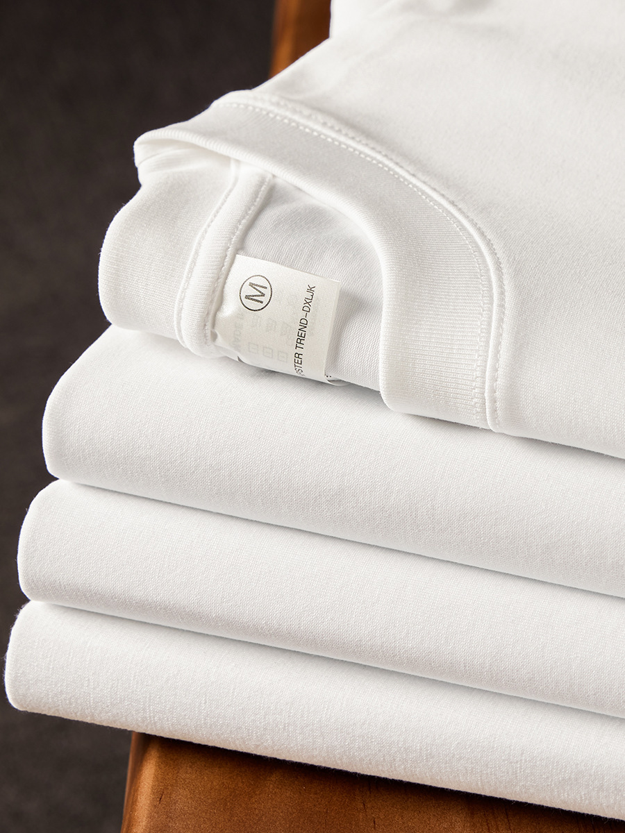 Nuevos productos de verano 260g camiseta de algodón pesado marca de moda calle suelta blanca de manga corta camisa de fondo de color sólido para hombre al por mayor