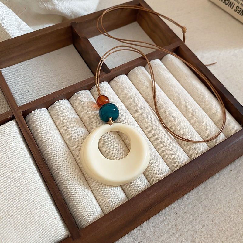 Maillard Collar retro para mujer estilo coreano nuevo suéter de nicho cadena moda otoño e invierno todo fósforo artículos de alta gama al por mayor