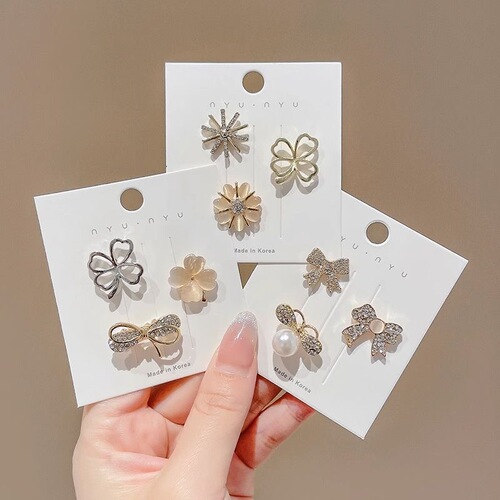 Butterfly knot cat's eye stone brooch for women, cute Japanese style, anti-hiding fastener, Instagram trendy, personalized pin to fix clothes, accessory