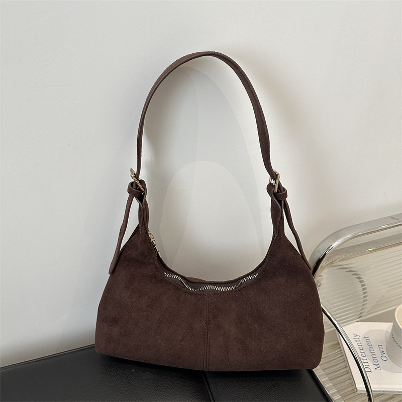 Bolsa coreana de seda texturizada 2024, nuevo nicho de diseño, bolso de palo, bolso de hombro retro de cuero pu.