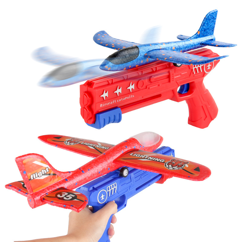 Tiktok Venta caliente espuma luminosa Catapulta Aviones pistola lanzador de mano planeador juguetes para niños al aire libre puesto juguetes del mercado nocturno