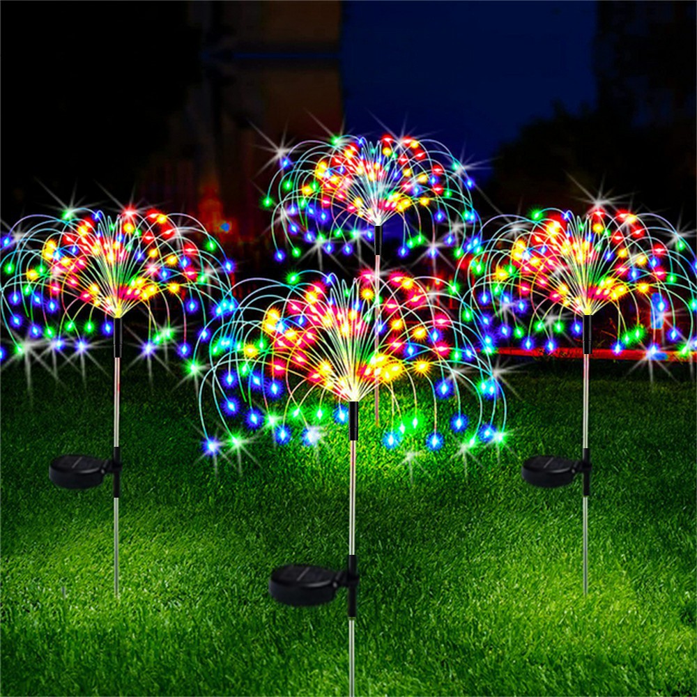 Lámpara de fuegos artificiales de inserción solar transfronteriza, luces de césped de cuatro colores, luces decorativas de ambiente al aire libre de jardín navideño navideño
