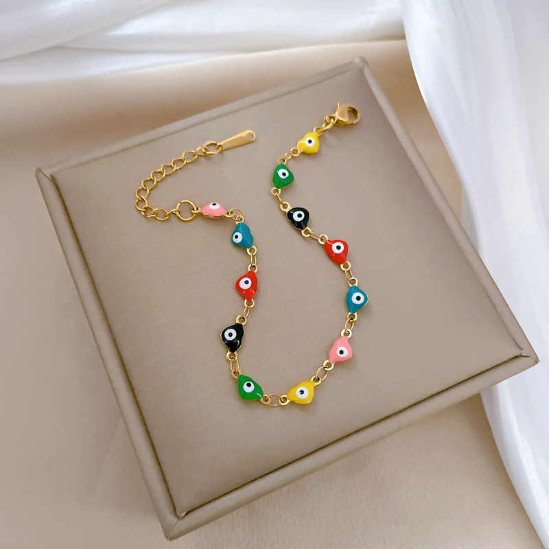 Pulsera minimalista de acero de titanio con ojo de color, estilo retro femenino