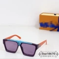 Purple frame, purple lenses, orange temples