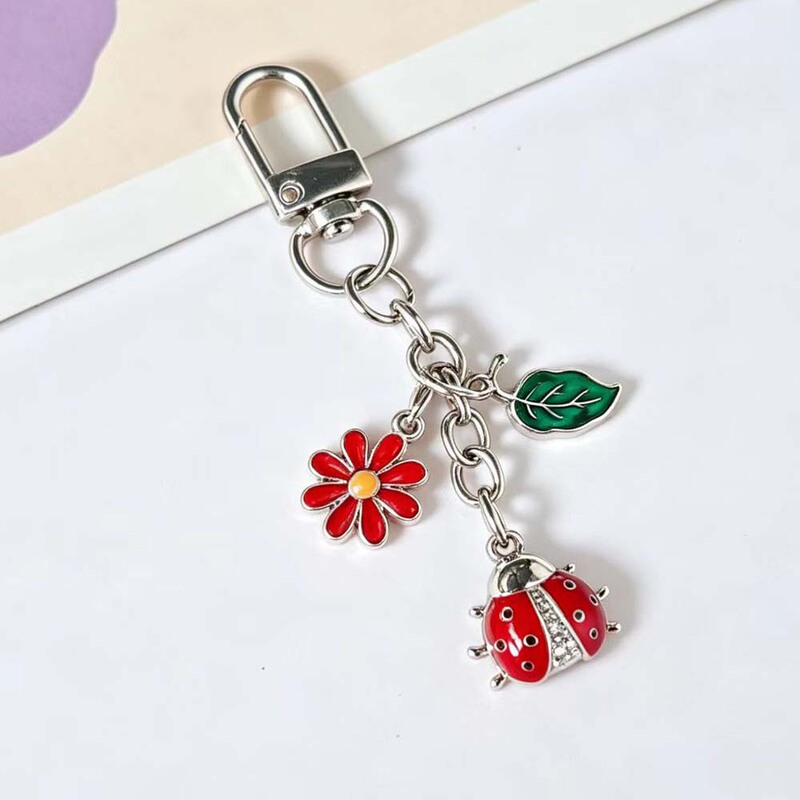 New Cross-Border Style Keychain with Rhinestones, Ladybug Design, Enamel Flowers and Green Leaves, Cute Pendant for Women's Bags, Wholesale Keychain New Cross-Border Style Keychain with Rhinestones, Ladybug Design, Enamel Flowers and Green Leaves, Cute Pendant for Women's Bags, Wholesale Keychain