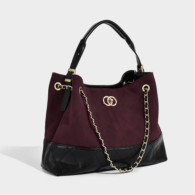 Xiaoxiangfeng2025 nuevo otoño y invierno de Nicholls herramienta de hierro de un hombro, bolsa de mano de moda de gran capacidad, bolsa de mano