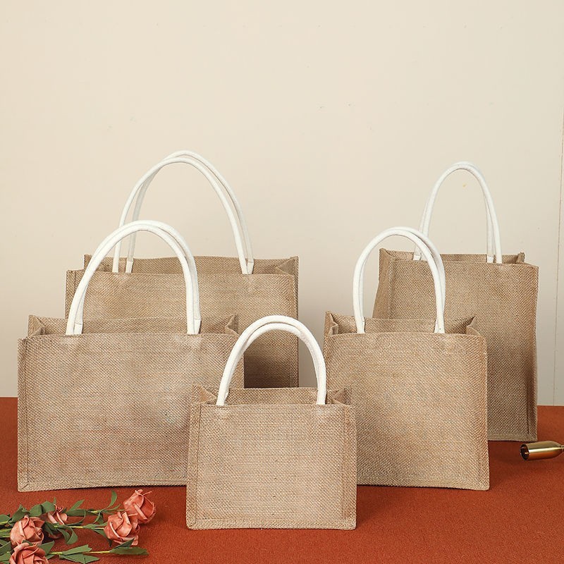 Fuente de fábrica de lino bolsa de lana quema de yute bolsas de regalo personalizadas con logotipo de impresión