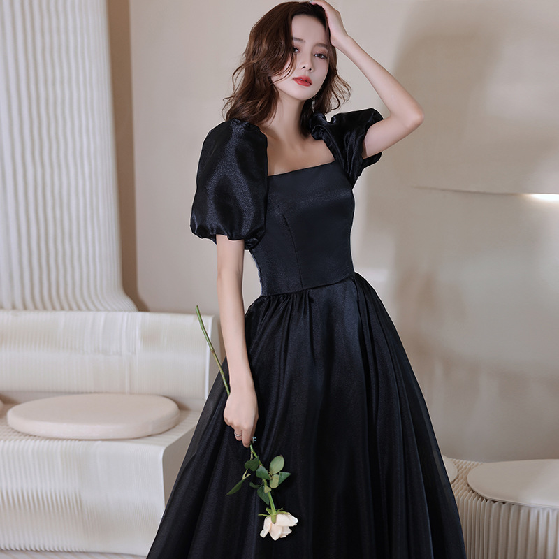 Vestido de noche negro para mujer, estilo nuevo de otoño 2025, manga abullonada, satén, para anfitriona de reunión anual, pasarela