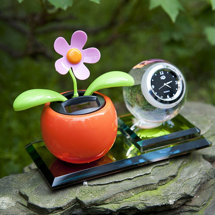 Solar car perfume ornaments crystal clock car ornaments car perfume holder shaking head sunflower decorations