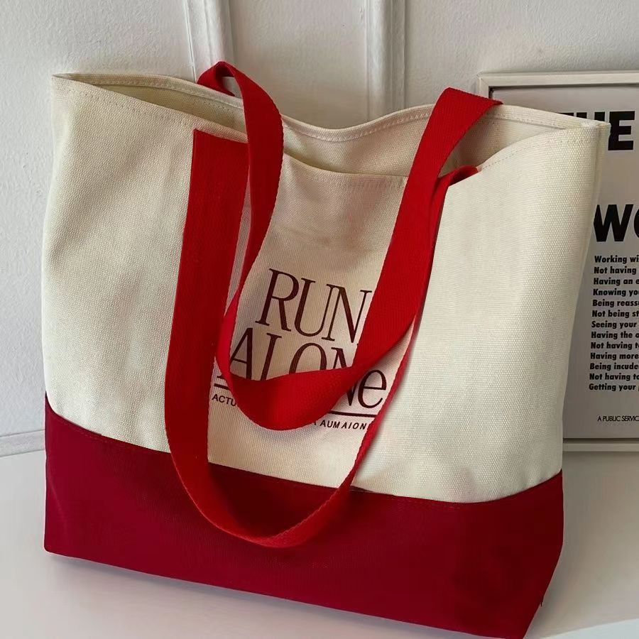 帆布包卡通新款休闲手提袋大容量包女百搭通勤托特单肩休闲包学生