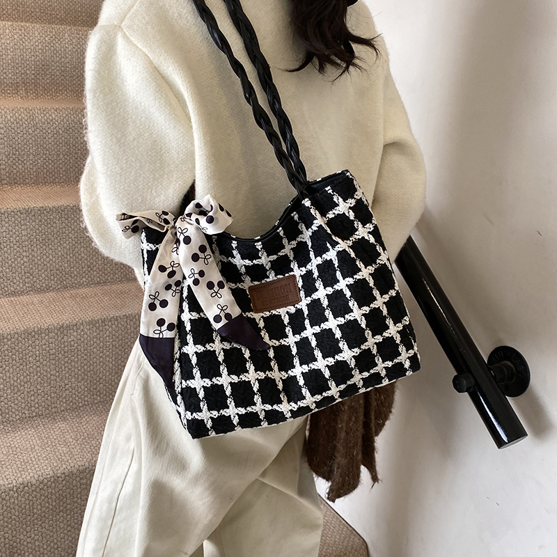 Bolsa de gran capacidad para mujeres 2025, nuevo tipo de bolso de hombro, bolso de compras de viaje, popular para mujeres.