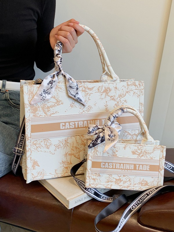 Bolsa de mano de comercio exterior transfronterizo para mujeres 2024 nueva moda simple impresión de letras mochila de hombro casual