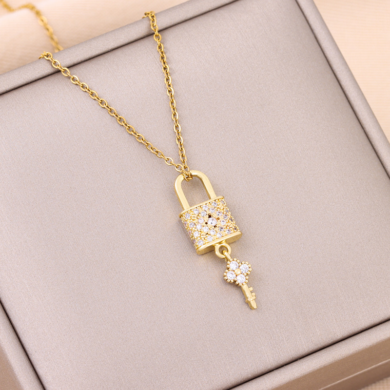 Elegant universal necklace with tassels for keys stainless steel
