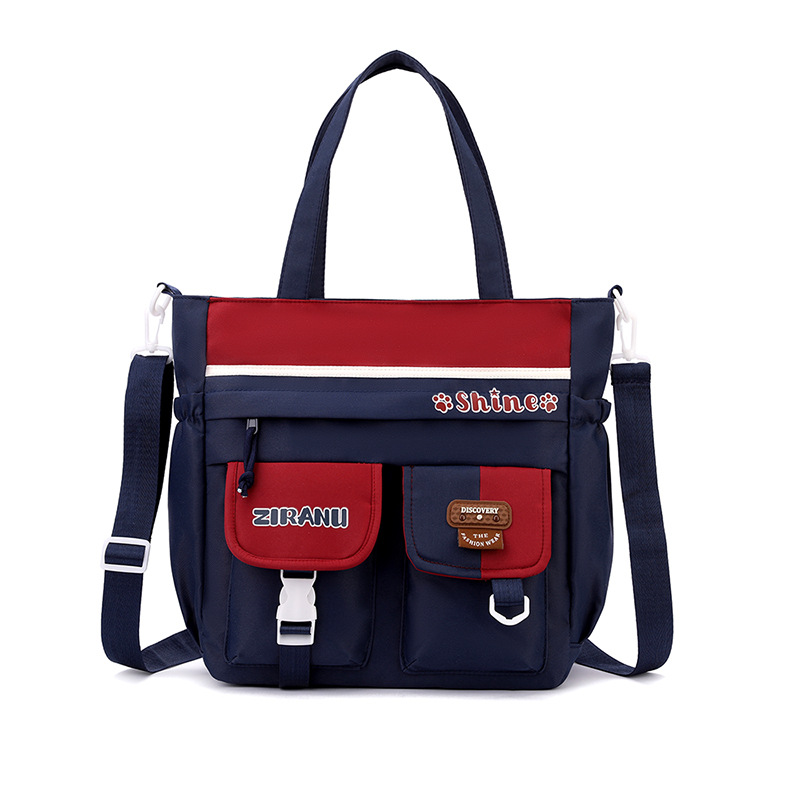 Mochila escolar transfronteriza para niñas, versión coreana elegante, gran capacidad, ligera, que reduce la carga y protege la columna vertebral, mochila de doble asa para estudiantes de secundaria.