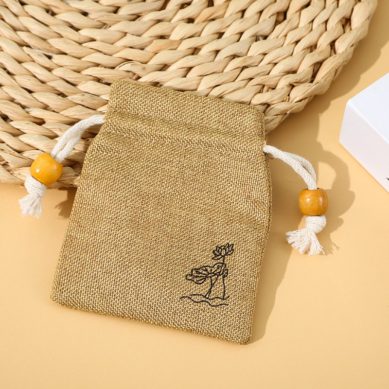 ひもを引く麻布のポケットの複合は麻の袋の高級な文をまねて皿のビーズの袋の青い磁器の包装袋の麻布の収納袋を遊びます。|undefined