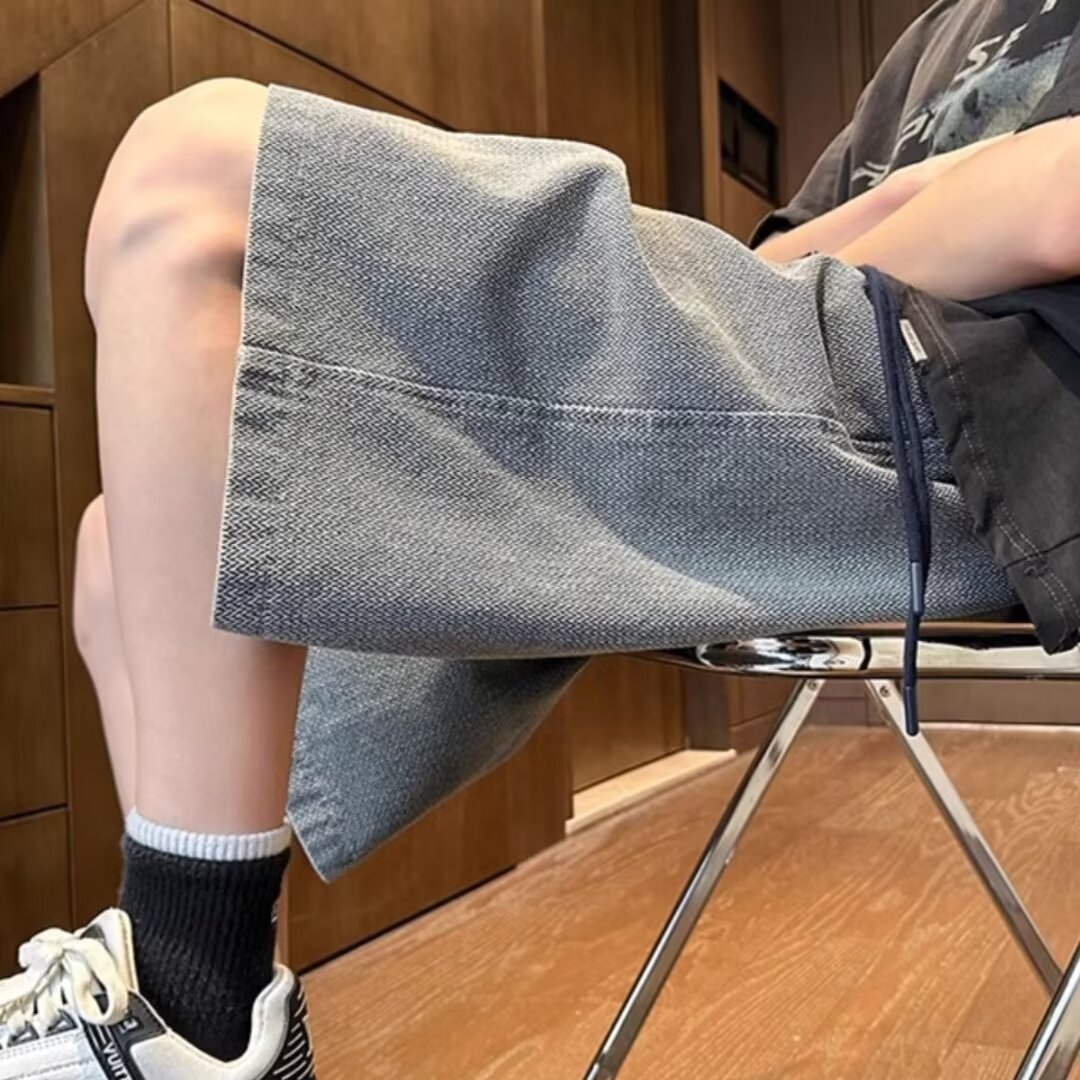 Pantalones casuales cortos de mezclilla de moda lavados, pantalones delgados de verano para hombres, pantalones deportivos rectos de todo fósforo de la calle americana, pantalones de cinco puntos