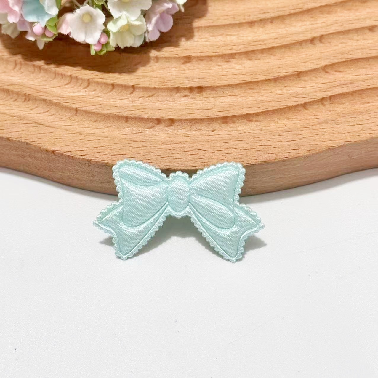 With bow, green