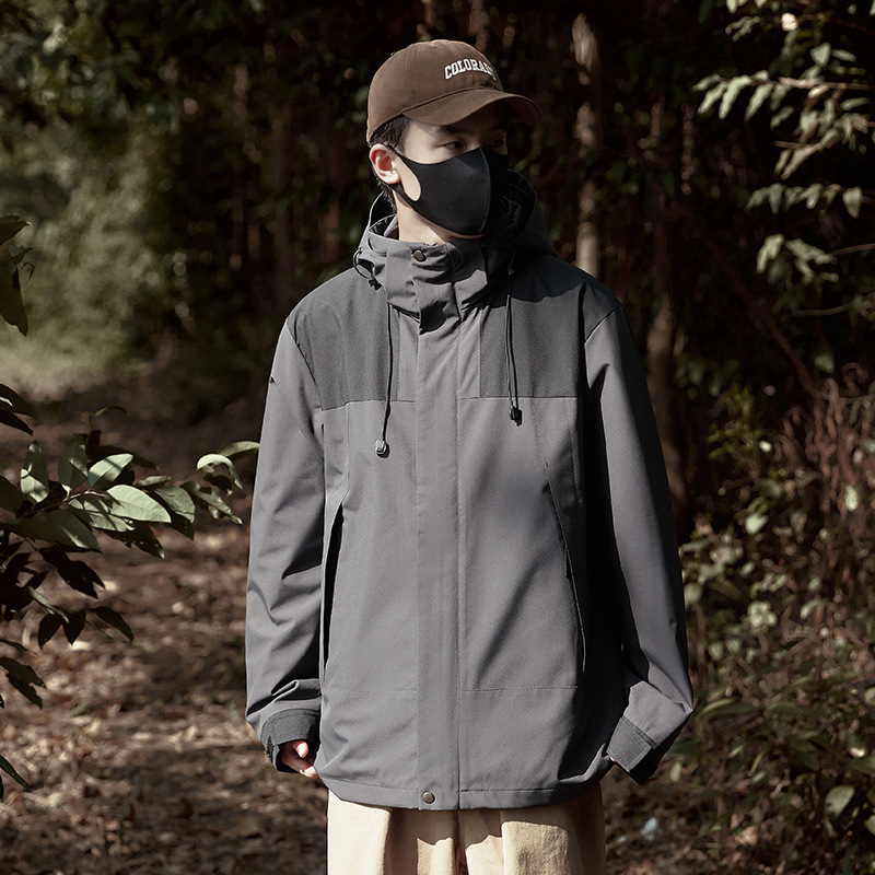 Hombres y mujeres tres en uno al aire libre desmontable a prueba de viento impermeable ropa de trabajo de montaña abrigo caliente logotipo impreso