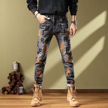 高档痞帅ins重工刺绣牛仔裤修男士春夏款弹力修身直筒百搭小脚裤