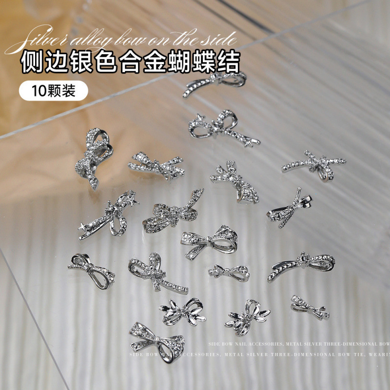 Alloy Bow Nail Art Rhinestone Versatile Three-Dimensional Silver Hollow Bow Tie Side Rhinestone Material Nail Art Accessories Alloy Bow Nail Art Rhinestone Versatile Three-Dimensional Silver Hollow Bow Tie Side Rhinestone Material Nail Art Accessories