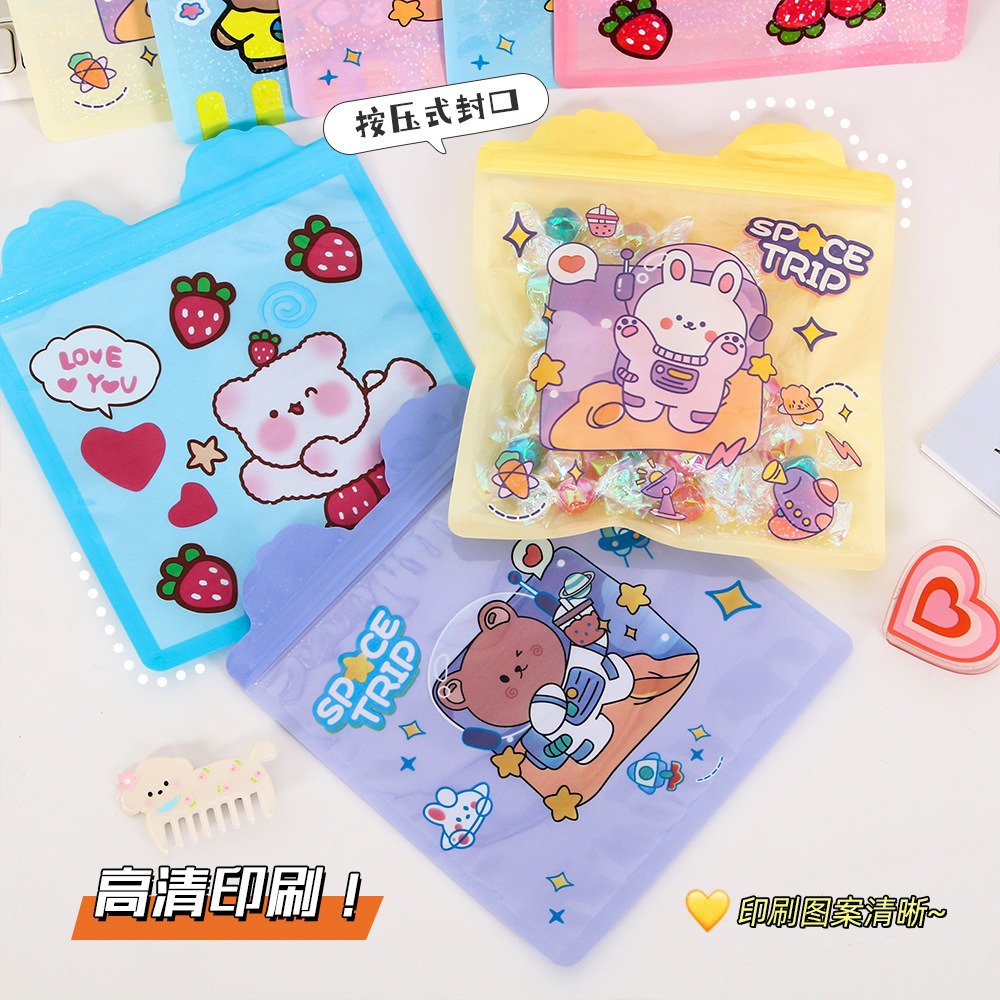 Bolsa de sello láser especial de dibujos animados personalizada encantadora bolsa de sello translúcida galletas bocadillos bolsa de embalaje de joyas