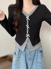 法式设计感蝴蝶结针织衫2025春秋新款黑色假两件撞色修身长袖上衣