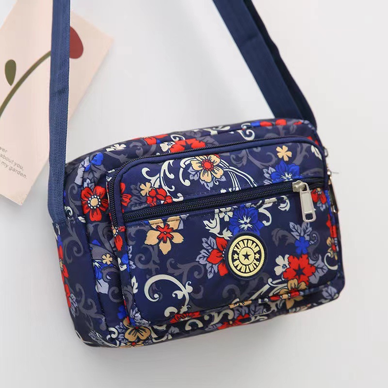 Bolsa de tela de flores bolsa de mensajero de las mujeres nueva bolsa de Madre de gran capacidad bolsa de hombro individual de mediana edad y ancianos bolsa de tela Oxford bolsa