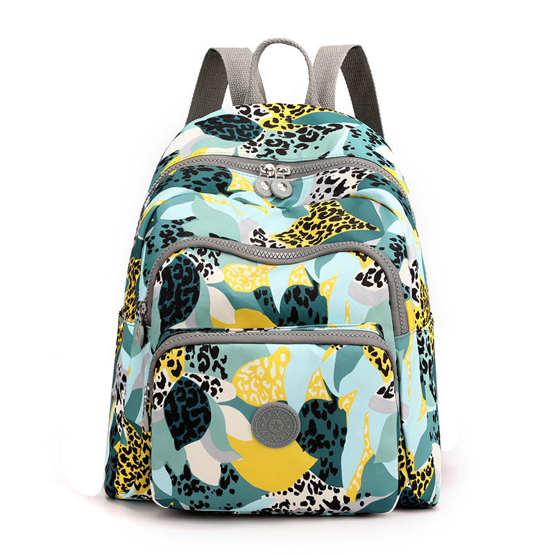 Bolsa de ocio para exteriores, gran capacidad, mochila de viaje versátil de nailon estampada para mujer, mochila de viaje moderna y sencilla
